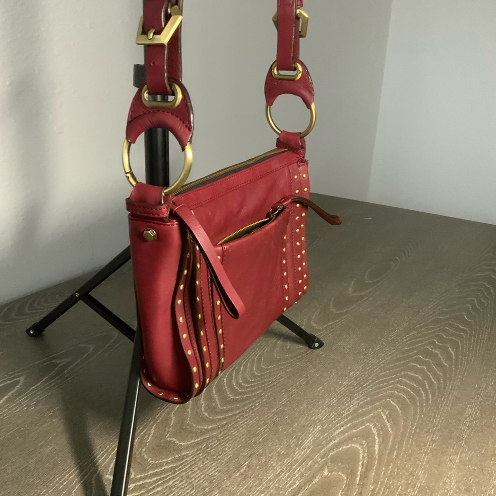 orYany Maroon Pebbled Leather Studded Crossbody - Picture 7 of 12